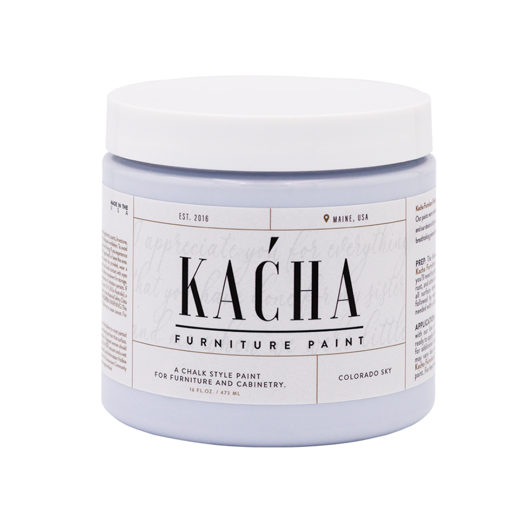 Jar of Kacha furniture paint on a white background